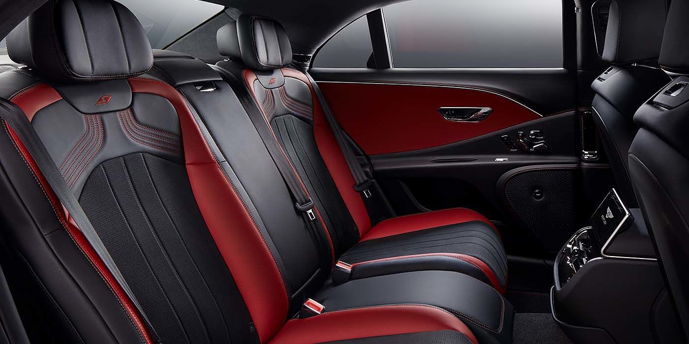 Bentley Bristol Bentley Flying Spur S sedan rear interior in Beluga black and Hotspur red hide with S stitching