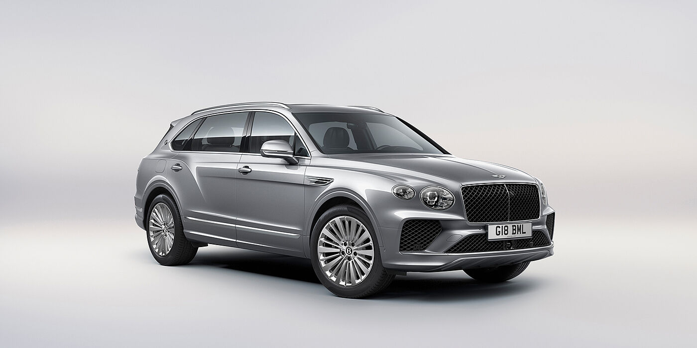 Bentley Bristol Bentley Bentayga Extended Wheelbase luxury SUV front three quarter view in Moonbeam paint with 21 inch five spoke painted wheels