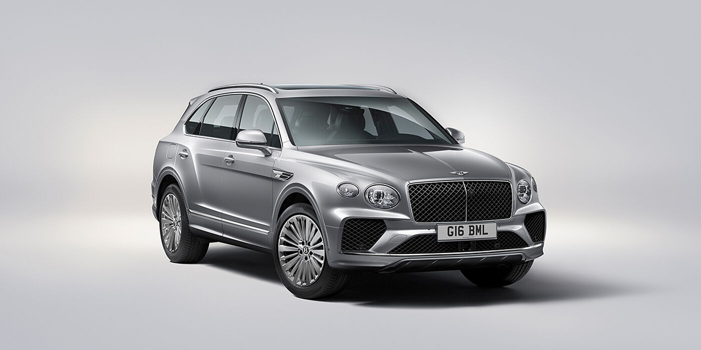 Bentley Bristol Bentley Bentayga luxury SUV front three quarter view in Moonbeam paint with matrix grille and 21″ 5 spoke painted wheels