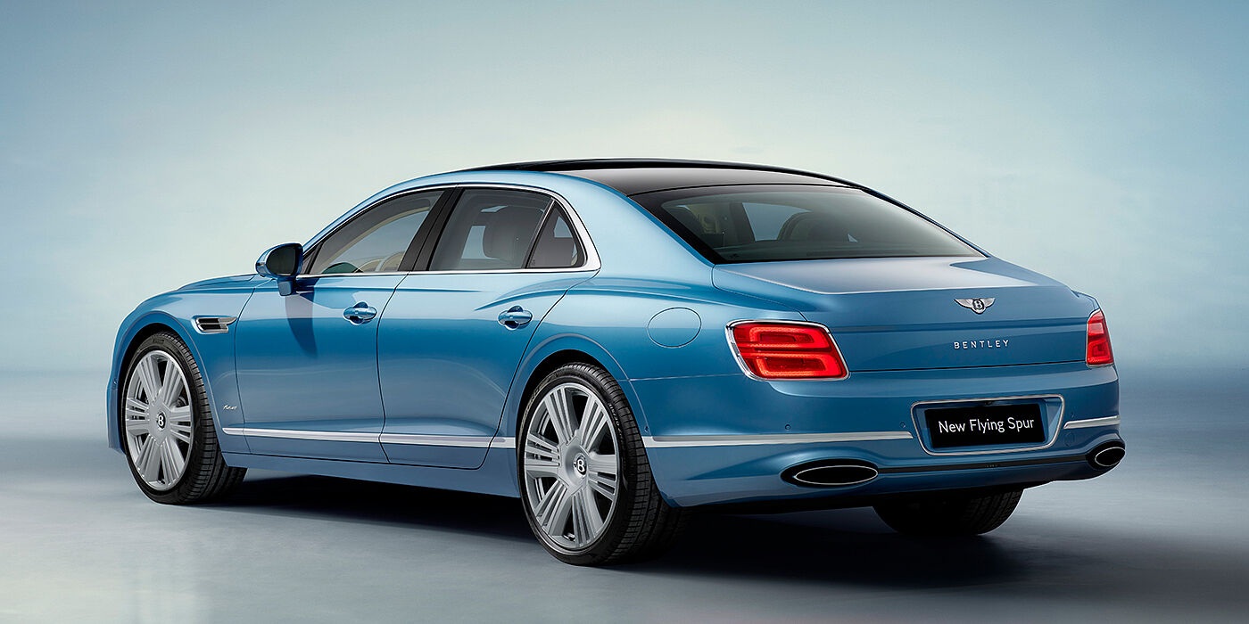 Bentley Bristol New Bentley Flying Spur Azure sedan rear view in Light windsor blue by Mulliner paint with 22 inch Azure wheels and chrome exterior details
