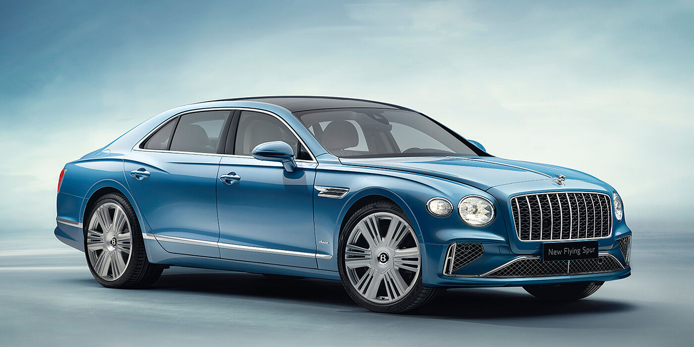 Bentley Bristol New Bentley Flying Spur Azure sedan front view in Light windsor blue by Mulliner paint with 22 inch Azure wheels and chrome exterior details